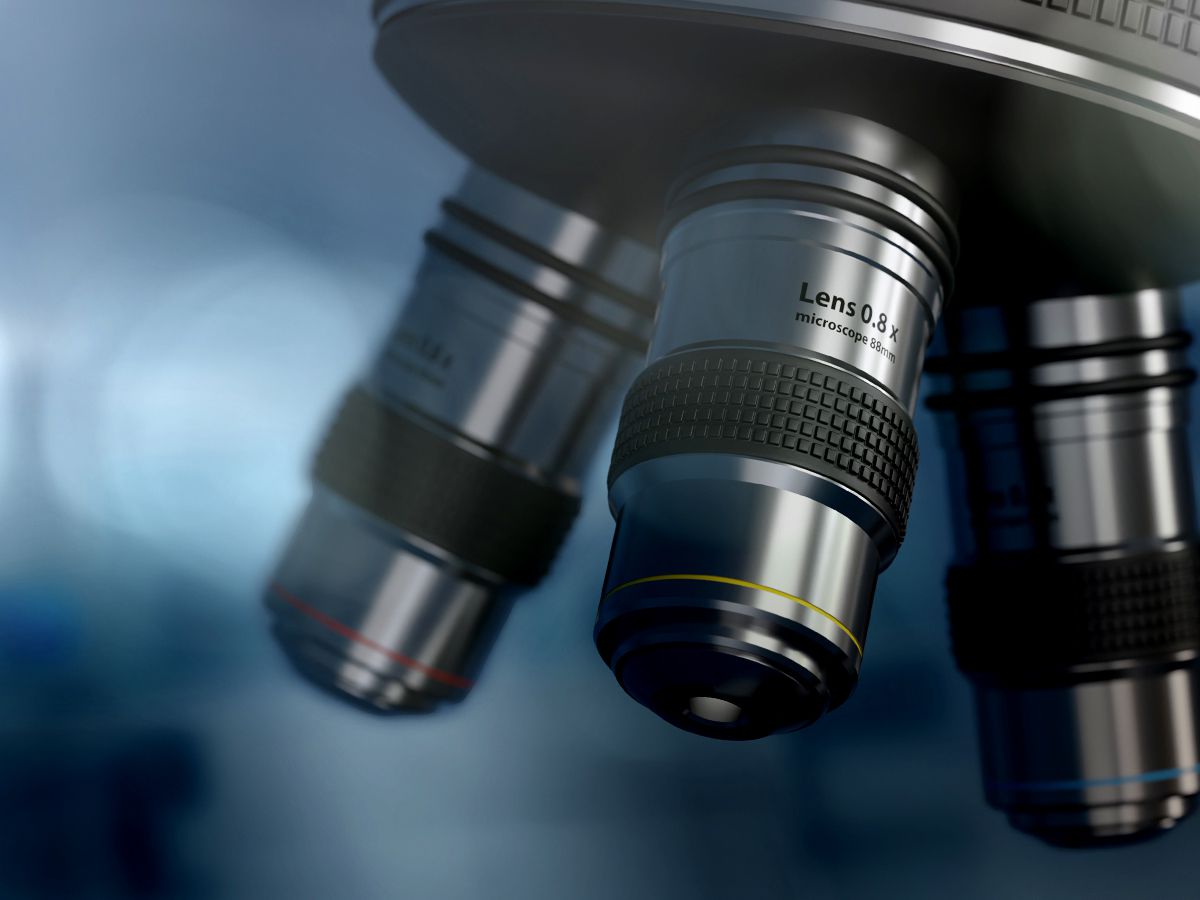 Multiple microscope objective lenses with different magnifications shown in close-up.